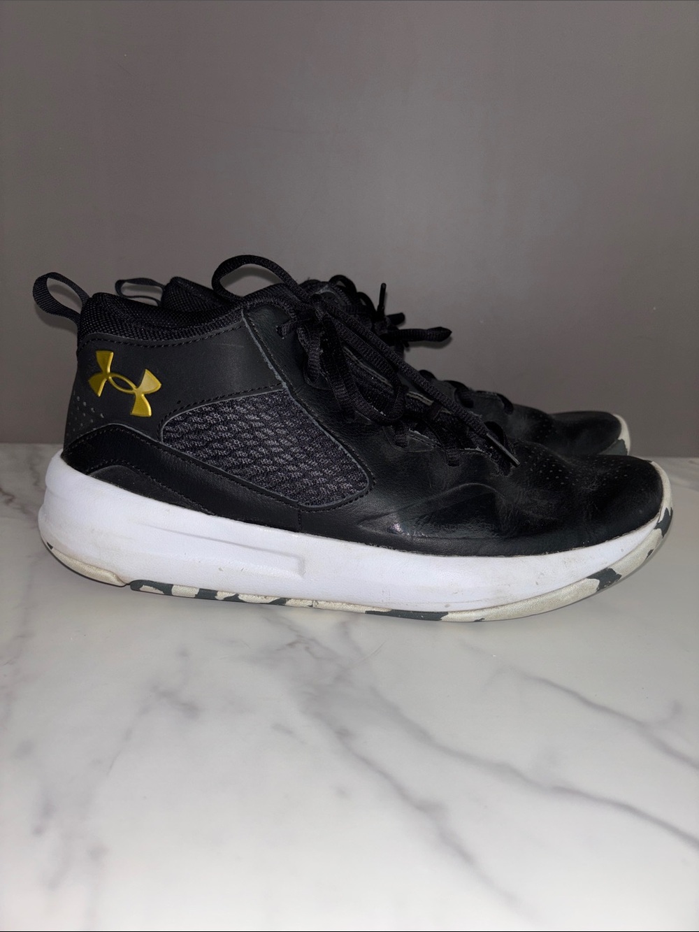Under Armour Black Sneakers with Gold Logo